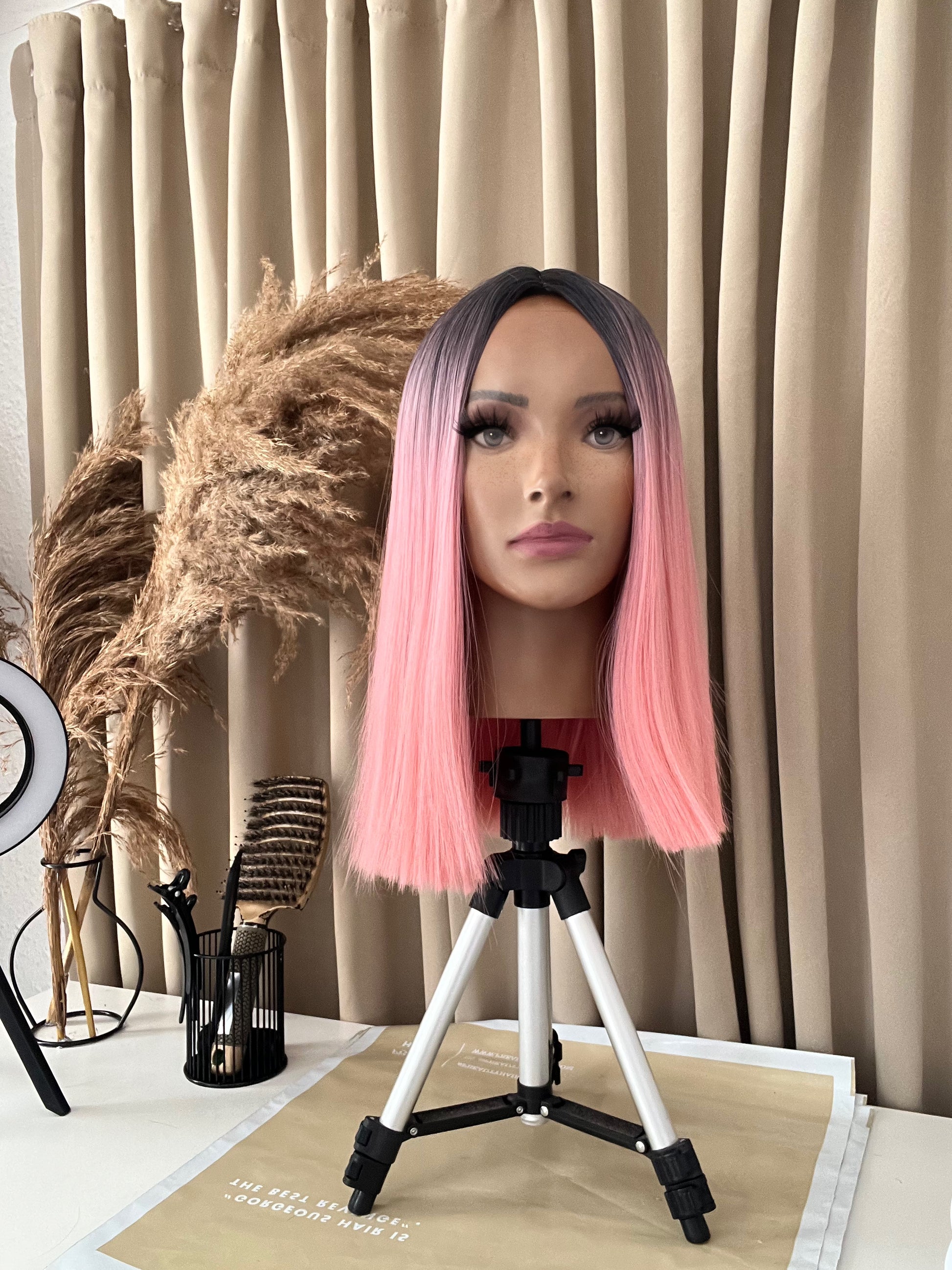 pink ombre hair wig on wig mannequin