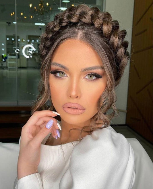 Pretty woman with braided updo hair