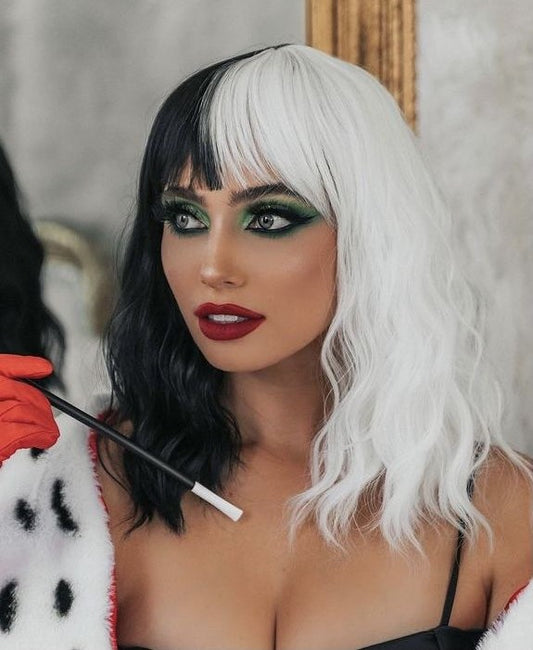 This Halloween hairstyle is bold and fierce with a Cruella-inspired twist—split black and white hair, sleek and dramatic, exudes high-fashion rebellion.