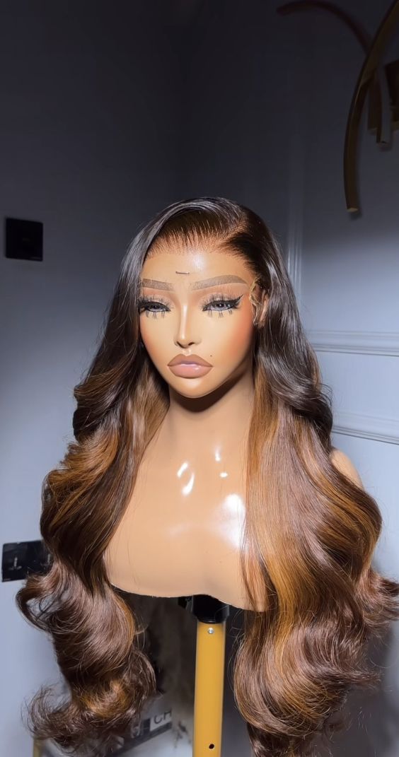 Natural-looking deep wave lace wig on a display mannequin
