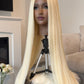 Full view of a long blonde lace front wig, emphasizing the glamorous length and high-quality synthetic hair