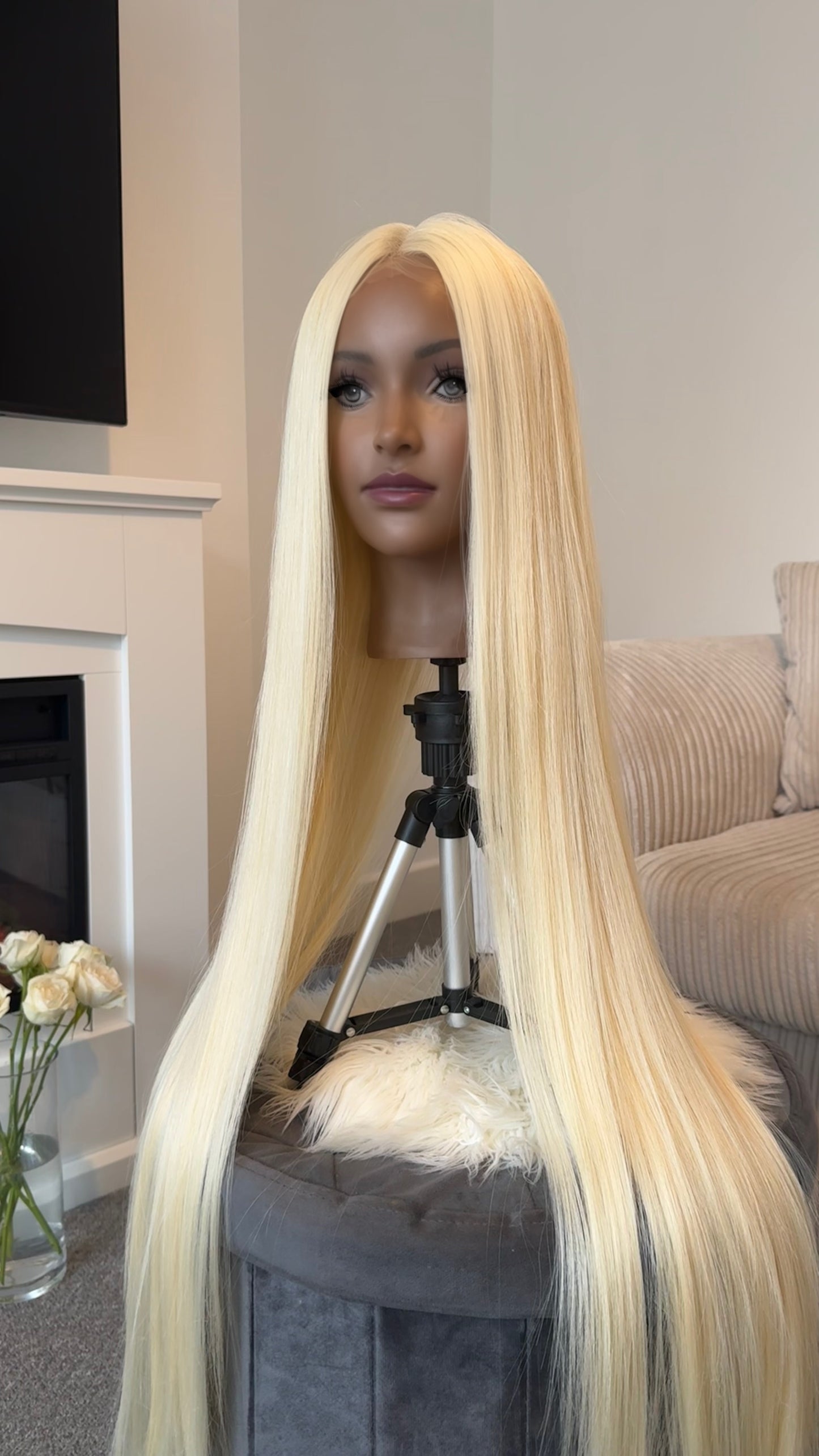 Full view of a long blonde lace front wig, emphasizing the glamorous length and high-quality synthetic hair