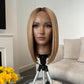 Honey blonde 14-inch synthetic lace front wig, short and heat resistant