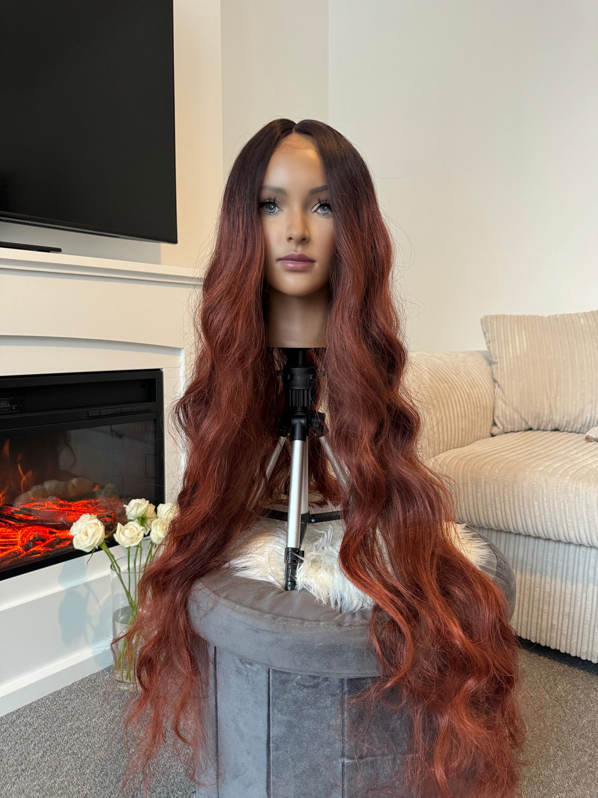 model 36-inch auburn long wavy lace front wig with a natural-looking hairline and premium synthetic fibers