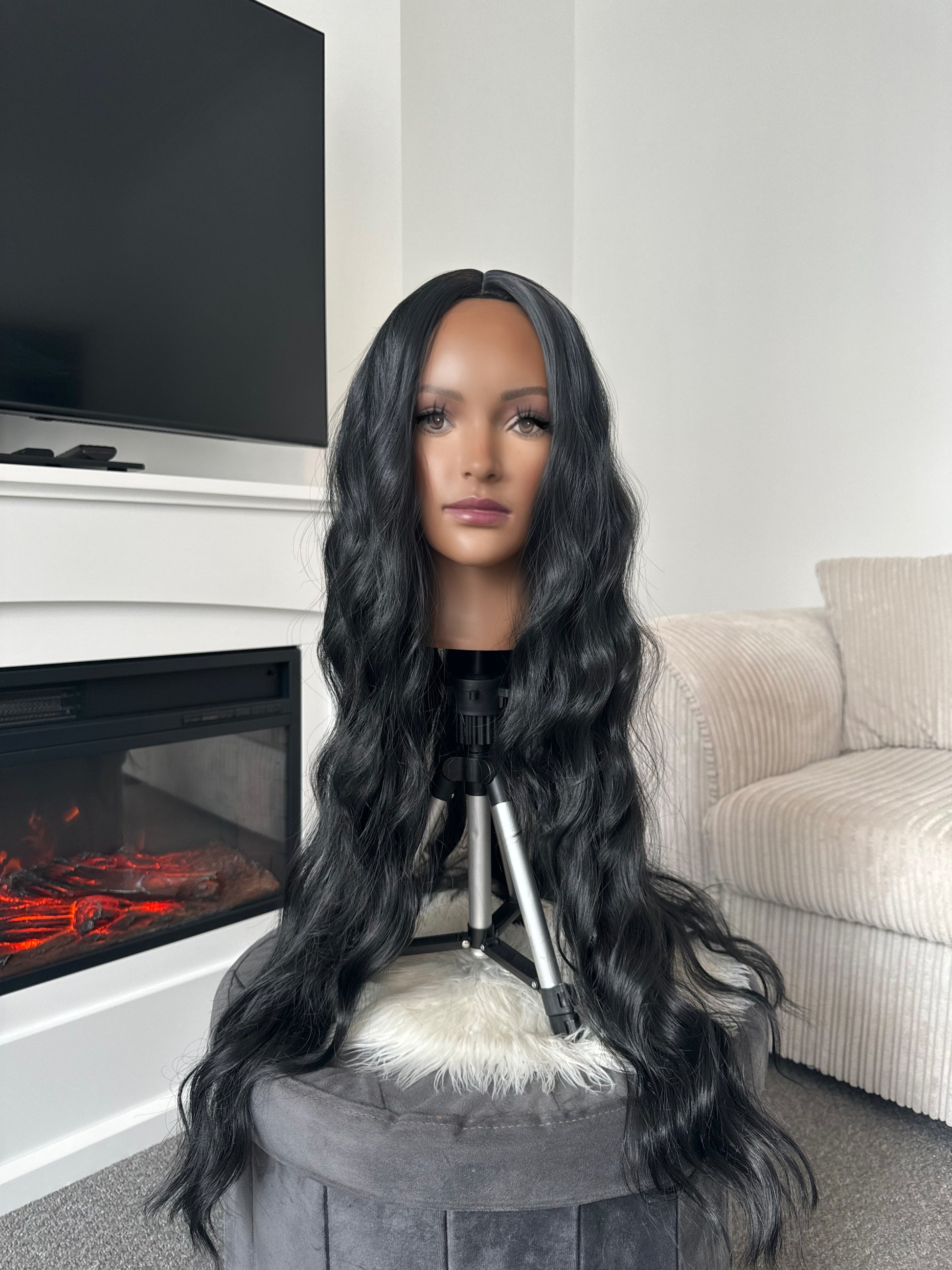 product Full view of the 28-inch wavy black synthetic wig, highlighting the natural wave pattern and length