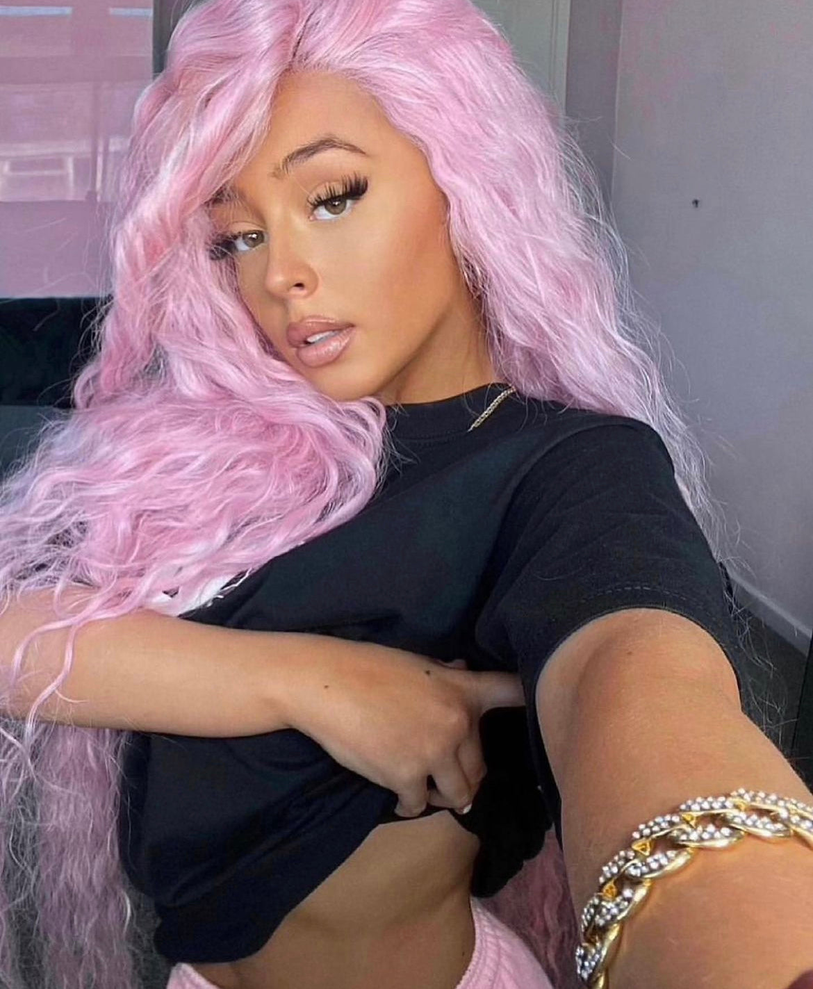 Beautiful model wearing pink long water wave synthetic hair lace front wig - pbeauty hair