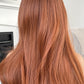 Back view of ginger hair wig highlighting smooth texture and shine.