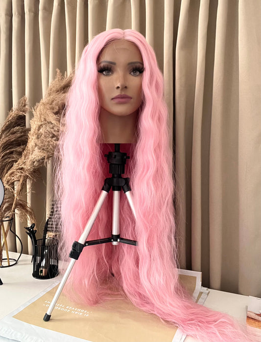 long wavy pink premium synthetic hair lace front wig from pbeautyhair on mannequin 