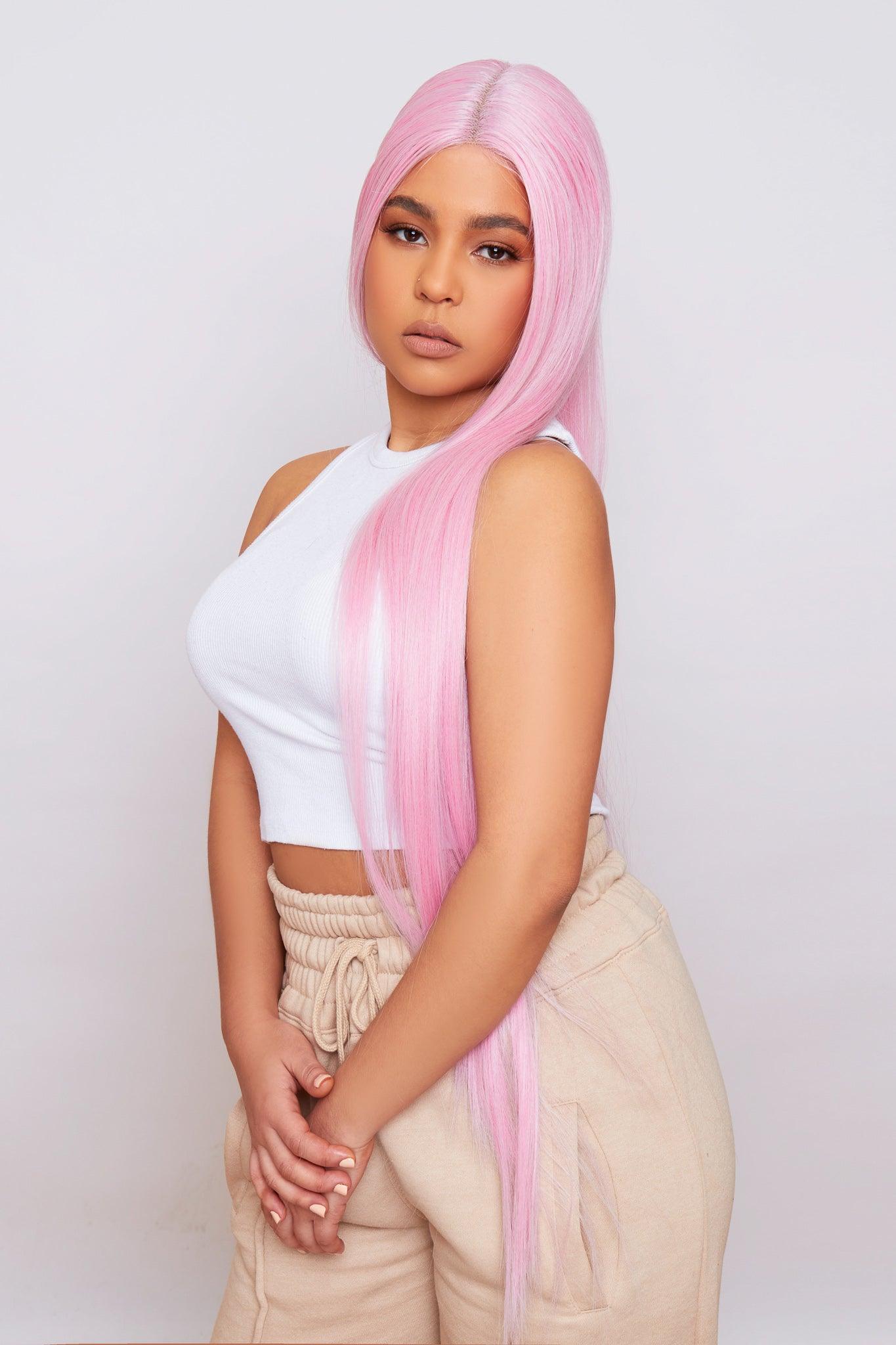 Pink lace front synthetic hair wig worn by mixed race model
