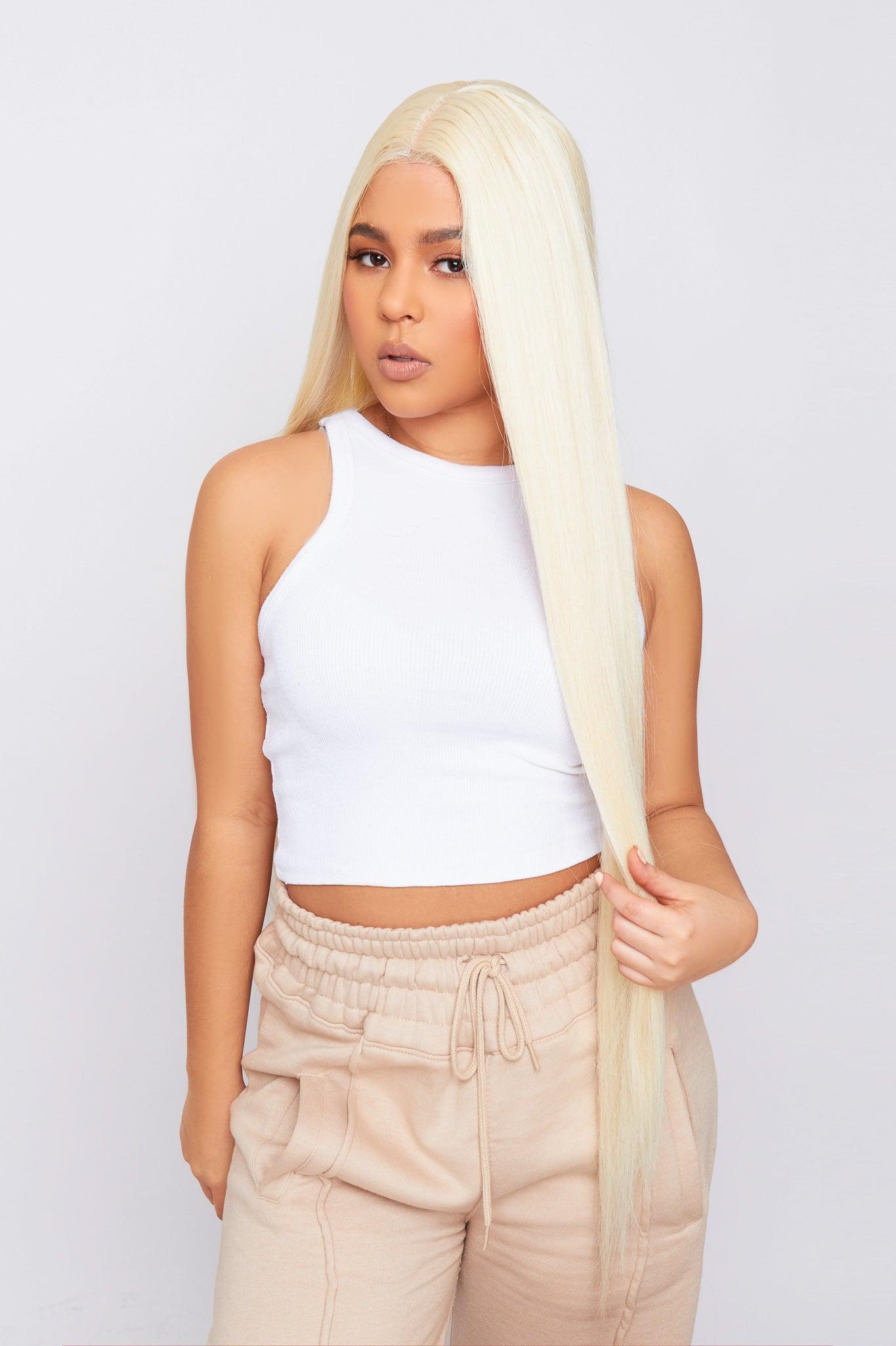 bleach blonde PBeauty hair wig worn by model 