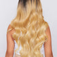 beautiful ombre blonde long wavy wig being worn by model from hair brand pbeauty hair