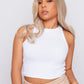 mixed race girl in natural blonde non lace synthetic hair wig wearing white top