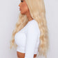 long wavy blonde hair wig being worn by girl from pbeauty hair