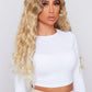 Blonde curly wig being worn by a beautiful model from pbeautyhair