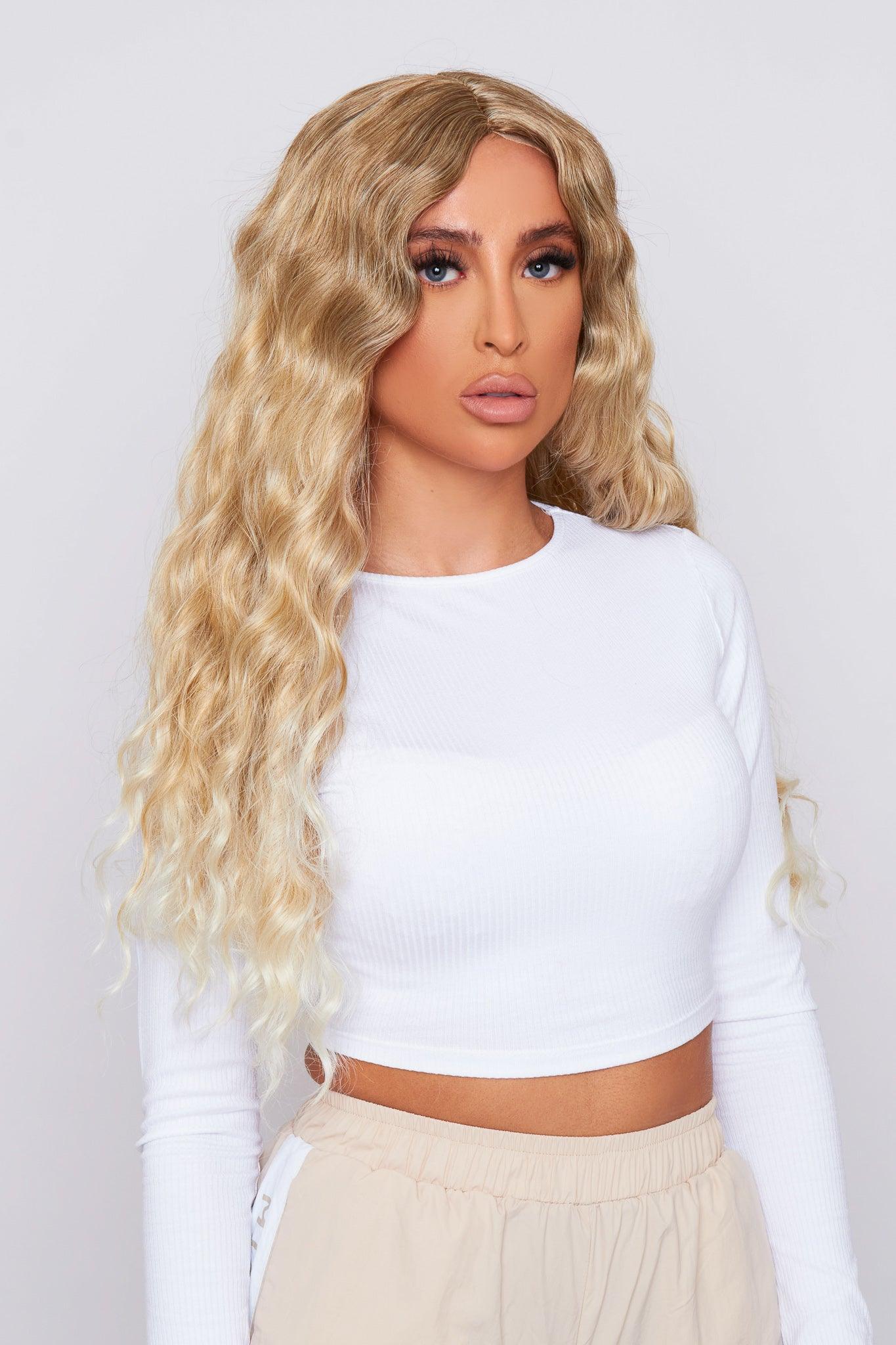 Blonde curly wig being worn by a beautiful model from pbeautyhair