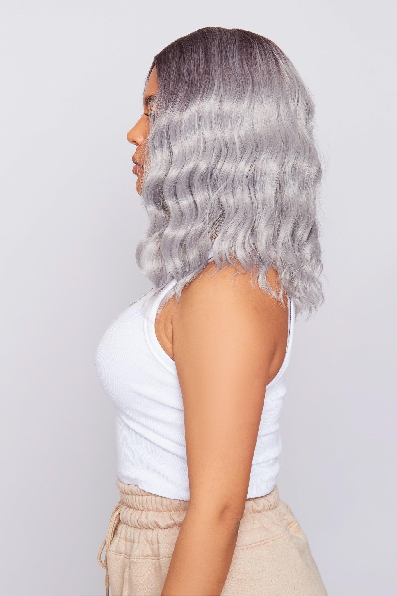 grey hair synthetic wig being worn by a female 